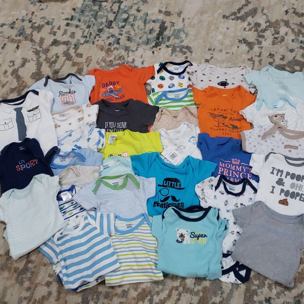 Lot of 31 0 to 3 month boy onesies.
